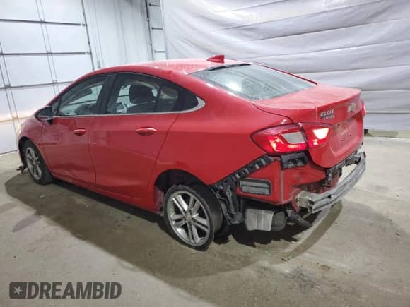 2018 Chevrolet Cruze LT z VIN 1G1BE5SM6J7130373, wystawiony jako Copart lot #70095855 z przebiegiem 135 592 mil mil oraz Szkoda całkowita • Salvage title. Historia ofert i sprzedaży dostępna na DreamBid. Obrazek 2.