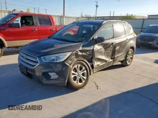 ✅ 2018 Ford Escape SEL • VIN: 1FMCU0HD9JUD28645 • Лот: 86084225. Опубликован ранее на Copart с пробегом 124 461 миль. Бесплатный доступ к архиву аукционных продаж из США и подробный отчёт об истории автомобиля на DreamBid. Изображение 1.