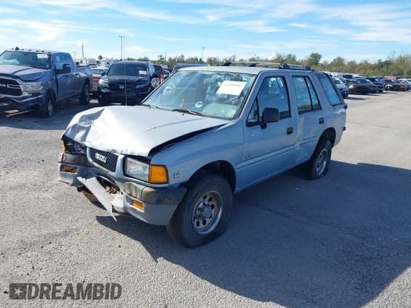 ✅ 1992 Isuzu Rodeo • VIN: 4S2CG58Z4N4325991 • Lot: 11290902. Listed on IAAI with 208,660 mi. Free auction sales archive from the USA and detailed vehicle history report at DreamBid. Image 2.