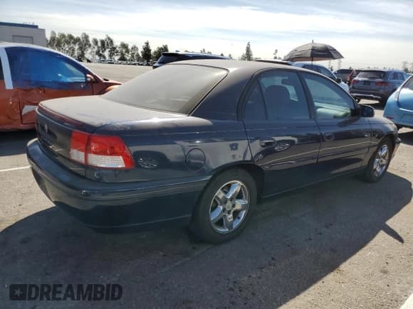 ✅ 2000 Cadillac Catera • VIN: W06VR54R2YR009874 • Lot: 80943625. Listed on Copart with 118,513 mi. Free auction sales archive from the USA and detailed vehicle history report at DreamBid. Image 3.