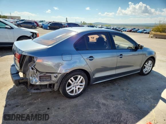 ✅ 2018 Volkswagen Jetta S • VIN: 3VW2B7AJ3JM232946 • Lot: 86692045. Listed on Copart with 68,504 mi. Free auction sales archive from the USA and detailed vehicle history report at DreamBid. Image 3.