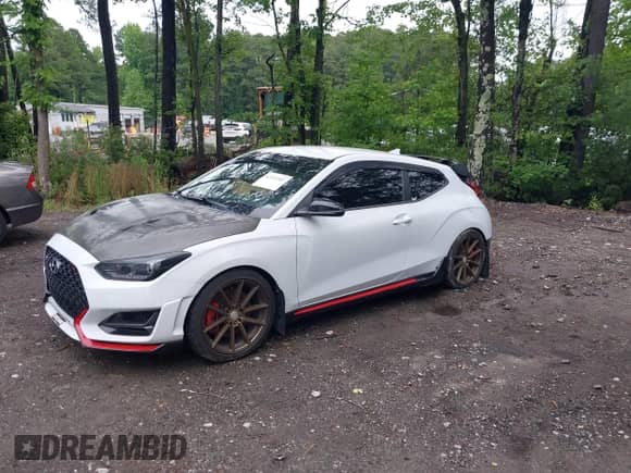 2020 Hyundai Veloster z VIN KMHT36AHXLU003718, wystawiony jako IAAI lot #42331507 z przebiegiem 82 020 mil mil oraz . Historia ofert i sprzedaży dostępna na DreamBid. Obrazek 2.