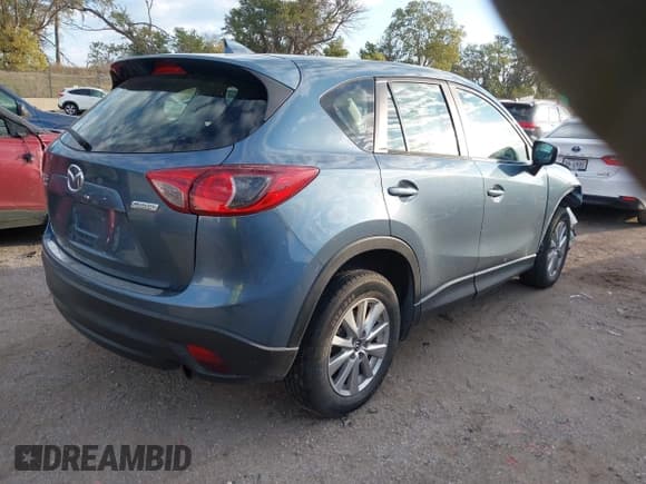 ✅ 2016 Mazda CX-5 Sport • VIN: JM3KE4BY4G0660953 • Лот: 43450266. Опубликован ранее на IAAI с пробегом 140 627 миль. Бесплатный доступ к архиву аукционных продаж из США и подробный отчёт об истории автомобиля на DreamBid. Изображение 4.