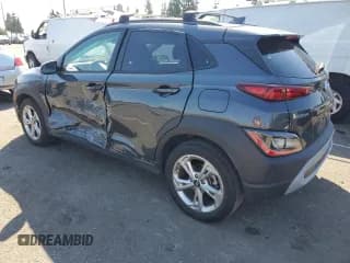 ✅ 2022 Hyundai Kona SEL • VIN: KM8K62AB0NU813014 • Лот: 74639044. Опубликован ранее на Copart с пробегом 50 233 миль. Бесплатный доступ к архиву аукционных продаж из США и подробный отчёт об истории автомобиля на DreamBid. Изображение 2.