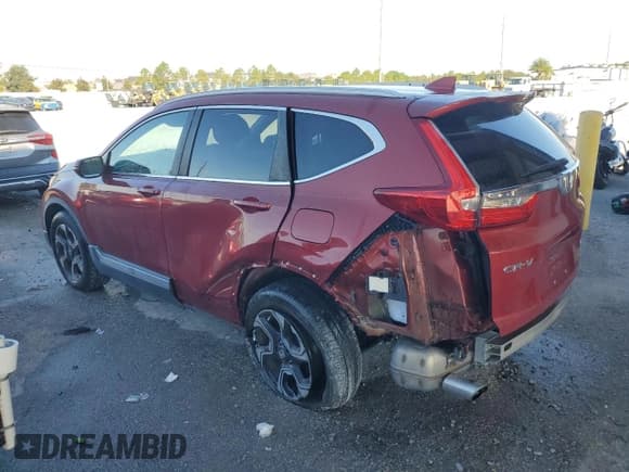 ✅ 2018 Honda CR-V Touring • VIN: 5J6RW1H93JL012832 • Лот: 86484635. Опубликован ранее на Copart с пробегом 55 933 миль. Бесплатный доступ к архиву аукционных продаж из США и подробный отчёт об истории автомобиля на DreamBid. Изображение 2.