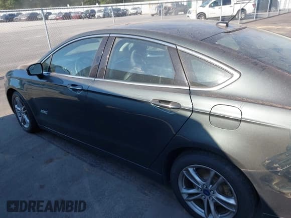 ✅ 2015 Ford Fusion Titanium • VIN: 3FA6P0SU8FR243611 • Lot: 43169838. Wystawiony na IAAI z przebiegiem 131 248 mil. Bezpłatny archiwum sprzedaży aukcyjnych z USA i szczegółowy raport historii pojazdu na DreamBid. Zdjęcie 14.