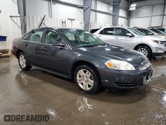 ✅ 2014 Chevrolet Impala LT • VIN: 2G1WB5E35E1112642 • Lot: 85209705. Listed on Copart with 161,688 mi. Free auction sales archive from the USA and detailed vehicle history report at DreamBid. Image 4.