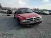 2004 Dodge Dakota z VIN 1D7GL12K34S504035, wystawiony jako Copart lot #46815725 z przebiegiem Nie podano mil oraz Szkoda całkowita • Salvage title. Historia ofert i sprzedaży dostępna na DreamBid. Obrazek 10.