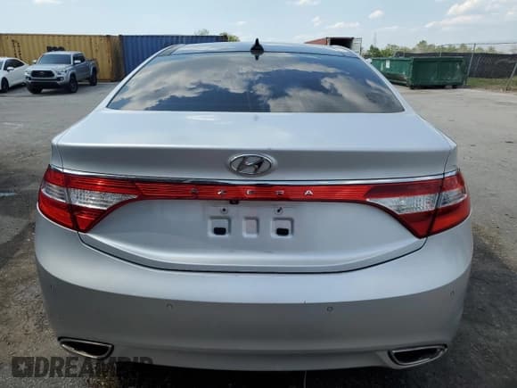 ✅ 2013 Hyundai Azera • VIN: KMHFH4JG8DA213103 • Лот: 57781955. Опубликован ранее на Copart с пробегом 173 515 миль. Бесплатный доступ к архиву аукционных продаж из США и подробный отчёт об истории автомобиля на DreamBid. Изображение 6.