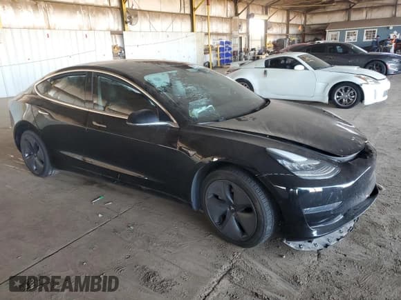 ✅ 2020 Tesla Model 3 Standard Range Plus • VIN: 5YJ3E1EA9LF630112 • Лот: 84725415. Опубликован ранее на Copart с пробегом 54 026 миль. Бесплатный доступ к архиву аукционных продаж из США и подробный отчёт об истории автомобиля на DreamBid. Изображение 4.
