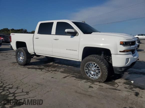✅ 2017 Chevrolet Silverado 1500 LT • VIN: 3GCUKREC0HG302284 • Lot: 85297135. Listed on Copart with 127,698 mi. Free auction sales archive from the USA and detailed vehicle history report at DreamBid. Image 4.