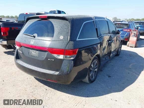 ✅ 2014 Honda Odyssey Touring • VIN: 5FNRL5H99EB051715 • Lot: 43405838. Listed on IAAI with 176,921 mi. Free auction sales archive from the USA and detailed vehicle history report at DreamBid. Image 4.