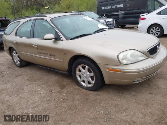 ✅ 2001 Mercury Sable LS Premium • VIN: 1MEHM59S81G614407 • Lot: 42154755. Listed on IAAI with 209,478 mi. Free auction sales archive from the USA and detailed vehicle history report at DreamBid. Image 1.