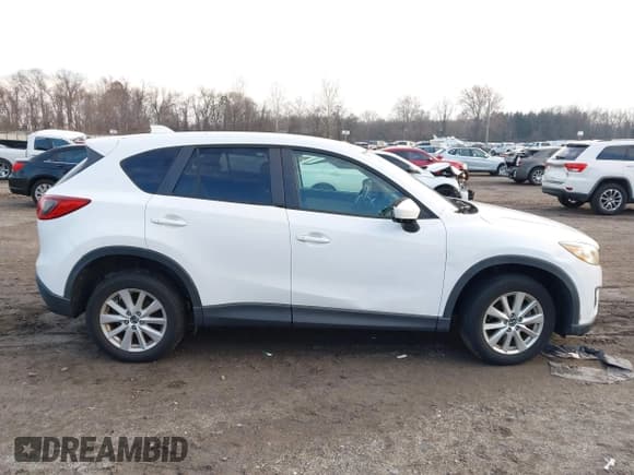 ✅ 2013 Mazda CX-5 Touring • VIN: JM3KE2CEXD0148702 • Lot: 43877352. Listed on IAAI with 183,342 mi. Free auction sales archive from the USA and detailed vehicle history report at DreamBid. Image 13.