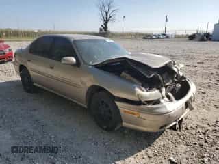 1998 Chevrolet Malibu LS z VIN 1G1NE52M3W6262601, wystawiony jako Copart lot #82218584 z przebiegiem Nie podano mil oraz Szkoda całkowita • Salvage title. Historia ofert i sprzedaży dostępna na DreamBid. Obrazek 4.