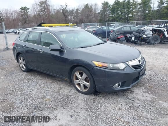 ✅ 2011 Acura TSX • VIN: JH4CW2H59BC001798 • Lot: 42008323. Listed on IAAI with 221,735 mi. Free auction sales archive from the USA and detailed vehicle history report at DreamBid. Image 1.