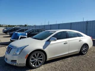 ✅ 2013 Cadillac XTS Luxury • VIN: 2G61R5S30D9213527 • Lot: 70205735. Listed on Copart with 152,844 mi. Free auction sales archive from the USA and detailed vehicle history report at DreamBid. Image 1.