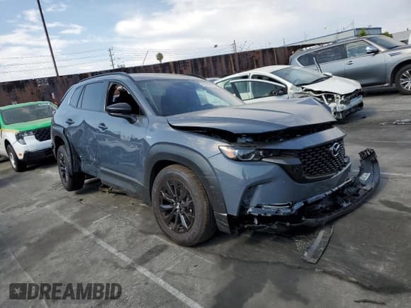 ✅ 2025 Mazda CX-50 Hybrid Premium Package • VIN: 7MMVAADWXSN120093 • Lot: 65423715. Wystawiony na Copart z przebiegiem 4 829 mil. Bezpłatny archiwum sprzedaży aukcyjnych z USA i szczegółowy raport historii pojazdu na DreamBid. Zdjęcie 4.
