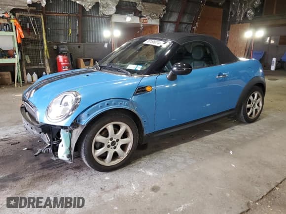 ✅ 2014 MINI Roadster • VIN: WMWSY1C53ET719549 • Lot: 80166874. Listed on Copart with 84,696 mi. Free auction sales archive from the USA and detailed vehicle history report at DreamBid. Image 1.