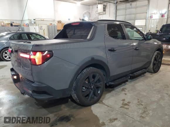 2023 Hyundai Santa Cruz Night Edition с VIN 5NTJCDAF6PH050812, выставлен на аукционе Copart как лот 85301874 с пробегом 42 677 миль миль и Списание • Salvage title. История ставок и продаж доступна на DreamBid. Изображение 3.