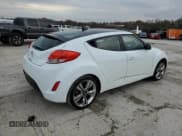 ✅ 2014 Hyundai Veloster • VIN: KMHTC6ADXEU184741 • Lot: 81136964. Wystawiony na Copart z przebiegiem 85 453 mil. Bezpłatny archiwum sprzedaży aukcyjnych z USA i szczegółowy raport historii pojazdu na DreamBid. Zdjęcie 3.