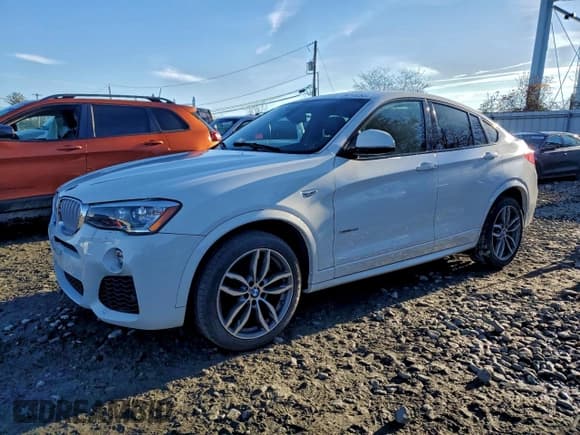 ✅ 2015 BMW X4 xDrive28i • VIN: 5UXXW3C52F0M87926 • Lot: 94218295. Listed on Copart with 94,567 mi. Free auction sales archive from the USA and detailed vehicle history report at DreamBid. Image 1.