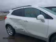 ✅ 2014 Buick Encore Leather • VIN: KL4CJGSB7EB520879 • Lot: 42006671. Listed on IAAI with 137,009 mi. Free auction sales archive from the USA and detailed vehicle history report at DreamBid. Image 6.