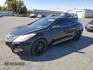 ✅ 2013 Hyundai Azera • VIN: KMHFG4JG8DA265818 • Лот: 81278665. Опубликован ранее на Copart с пробегом 194 563 миль. Бесплатный доступ к архиву аукционных продаж из США и подробный отчёт об истории автомобиля на DreamBid. Изображение 1.