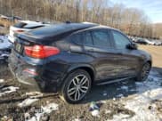 ✅ 2015 BMW X4 xDrive35i • VIN: 5UXXW5C55F0E88521 • Lot: 88212125. Listed on Copart with 63,127 mi. Free auction sales archive from the USA and detailed vehicle history report at DreamBid. Image 3.