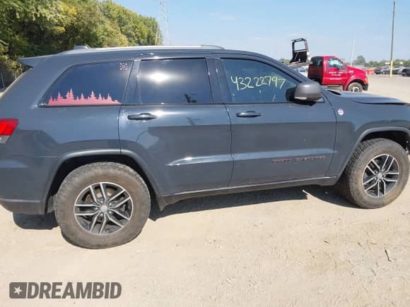 2017 Jeep Grand Cherokee Trailhawk with VIN 1C4RJFLG1HC790161, listed as a IAAI auction lot 43222197 with 142,785 mi miles and . Bid and sale history available at DreamBid. Image 13.