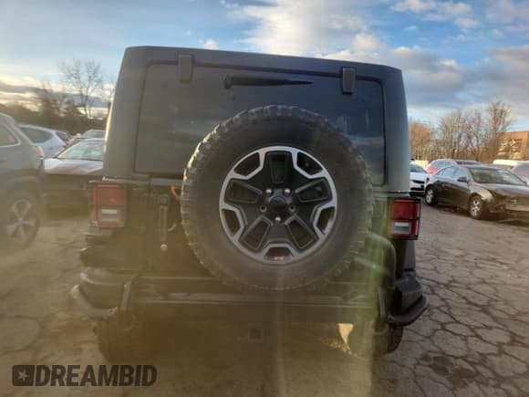 ✅ 2012 Jeep Wrangler Unlimited Rubicon • VIN: 1C4HJWFG7CL242990 • Лот: 92404395. Опубликован ранее на Copart с пробегом 121 247 миль. Бесплатный доступ к архиву аукционных продаж из США и подробный отчёт об истории автомобиля на DreamBid. Изображение 6.