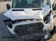 ✅ 2023 Ford Transit Cargo • VIN: 1FTBR3X80PKB02196 • Lot: 85529414. Listed on Copart with 89,528 mi. Free auction sales archive from the USA and detailed vehicle history report at DreamBid. Image 14.