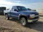 2002 Chevrolet Silverado 1500 LS with VIN 1GCEK14T72Z232488, listed as a Copart auction lot 72065155 with 193,997 mi miles and Salvage title. Bid and sale history available at DreamBid. Image 4.