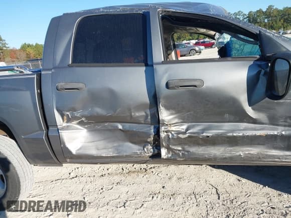 ✅ 2006 Dodge Dakota SLT • VIN: 1D7HE48N46S523939 • Lot: 43724699. Listed on IAAI with 168,366 mi. Free auction sales archive from the USA and detailed vehicle history report at DreamBid. Image 13.