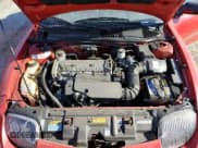 ✅ 1998 Pontiac Sunfire • VIN: 4G2JB32T7WB202549 • Lot: 75095294. Listed on Copart with 38,312 mi. Free auction sales archive from the USA and detailed vehicle history report at DreamBid. Image 11.