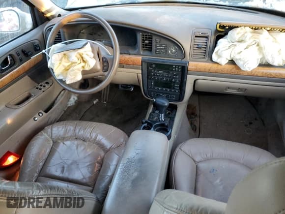 ✅ 2000 Lincoln Continental • VIN: 1LNHM97V6YY900603 • Lot: 85570864. Listed on Copart with 127,668 mi. Free auction sales archive from the USA and detailed vehicle history report at DreamBid. Image 8.