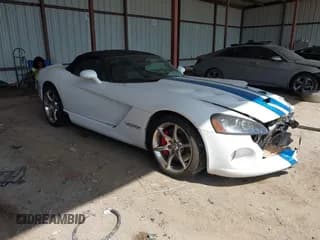 ✅ 2009 Dodge Viper SRT-10 • VIN: 1B3JZ65Z39V500286 • Lot: 41670434. Listed on IAAI with 120,854 mi. Free auction sales archive from the USA and detailed vehicle history report at DreamBid. Image 1.