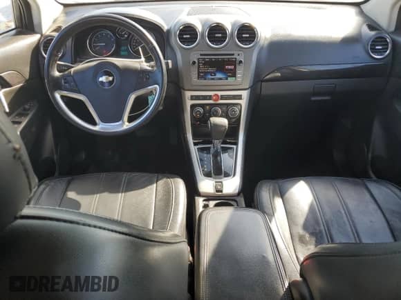 2014 Chevrolet Captiva Sport LT z VIN 3GNAL3EK3ES645580, wystawiony jako Copart lot #77821794 z przebiegiem 189 305 mil mil oraz Czysty tytuł • Clean title. Historia ofert i sprzedaży dostępna na DreamBid. Obrazek 8.