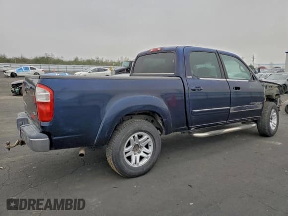 ✅ 2004 Toyota Tundra SR5 • VIN: 5TBET34104S446663 • Лот: 94290365. Опубликован ранее на Copart с пробегом 129 925 миль. Бесплатный доступ к архиву аукционных продаж из США и подробный отчёт об истории автомобиля на DreamBid. Изображение 3.