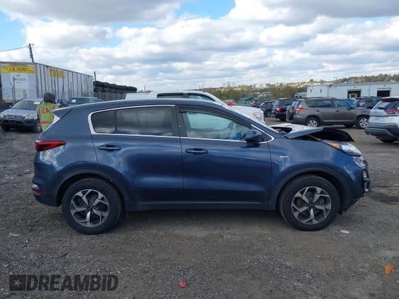 ✅ 2021 Kia Sportage LX • VIN: KNDPMCAC2M7889698 • Lot: 43537420. Listed on IAAI with 50,173 mi. Free auction sales archive from the USA and detailed vehicle history report at DreamBid. Image 14.