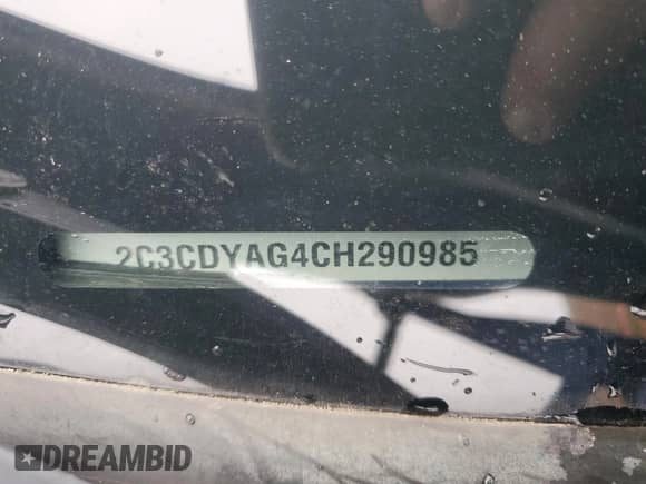 2012 Dodge Challenger SXT Plus with VIN 2C3CDYAG4CH290985, listed as a Copart auction lot 82078265 with 162,825 mi miles and Salvage title. Bid and sale history available at DreamBid. Image 12.