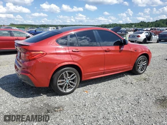 ✅ 2018 BMW X4 M40i • VIN: 5UXXW7C53J0W64838 • Lot: 61184545. Listed on Copart with 84,303 mi. Free auction sales archive from the USA and detailed vehicle history report at DreamBid. Image 3.