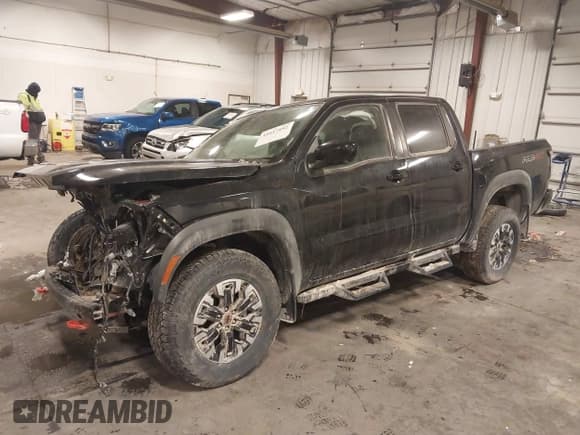 ✅ 2024 Nissan Frontier SV • VIN: 1N6ED1EK7RN611313 • Lot: 41617892. Listed on IAAI with 4,425 mi. Free auction sales archive from the USA and detailed vehicle history report at DreamBid. Image 2.