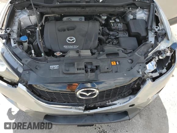 ✅ 2014 Mazda CX-5 Sport • VIN: JM3KE2BE5E0425324 • Лот: 69742435. Опубликован ранее на Copart с пробегом 108 288 миль. Бесплатный доступ к архиву аукционных продаж из США и подробный отчёт об истории автомобиля на DreamBid. Изображение 12.