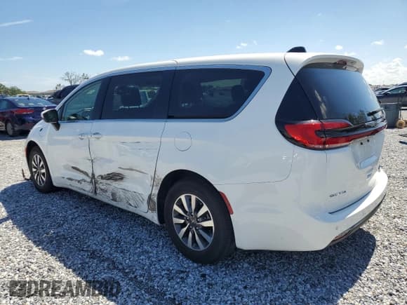 ✅ 2023 Chrysler Pacifica Hybrid Touring L • VIN: 2C4RC1L74PR558768 • Lot: 61407555. Listed on Copart with 70,387 mi. Free auction sales archive from the USA and detailed vehicle history report at DreamBid. Image 2.