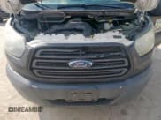 ✅ 2015 Ford Transit Cargo • VIN: 1FTNE1ZM6FKA10483 • Lot: 60918755. Listed on Copart with 333,904 mi. Free auction sales archive from the USA and detailed vehicle history report at DreamBid. Image 11.