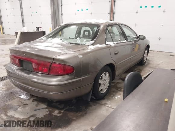 ✅ 2002 Buick Regal LS • VIN: 2G4WB52K521167117 • Lot: 43893969. Listed on IAAI with 138,587 mi. Free auction sales archive from the USA and detailed vehicle history report at DreamBid. Image 4.