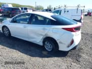 ✅ 2022 Toyota Prius LE • VIN: JTDKAMFP8N3198379 • Lot: 42094943. Listed on IAAI with 14,428 mi. Free auction sales archive from the USA and detailed vehicle history report at DreamBid. Image 3.