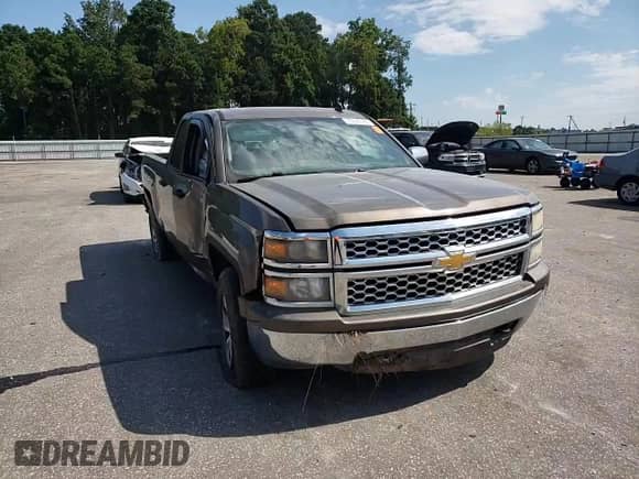 2014 Chevrolet Silverado 1500 LT с VIN 1GCVKREC3EZ300772, выставлен на аукционе Copart как лот 70127165 с пробегом 208 135 миль миль и Списание • Salvage title. История ставок и продаж доступна на DreamBid. Изображение 13.