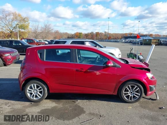 ✅ 2013 Chevrolet Sonic LT • VIN: 1G1JC6SG0D4160069 • Лот: 43617054. Опубликован ранее на IAAI с пробегом 92 104 миль. Бесплатный доступ к архиву аукционных продаж из США и подробный отчёт об истории автомобиля на DreamBid. Изображение 13.